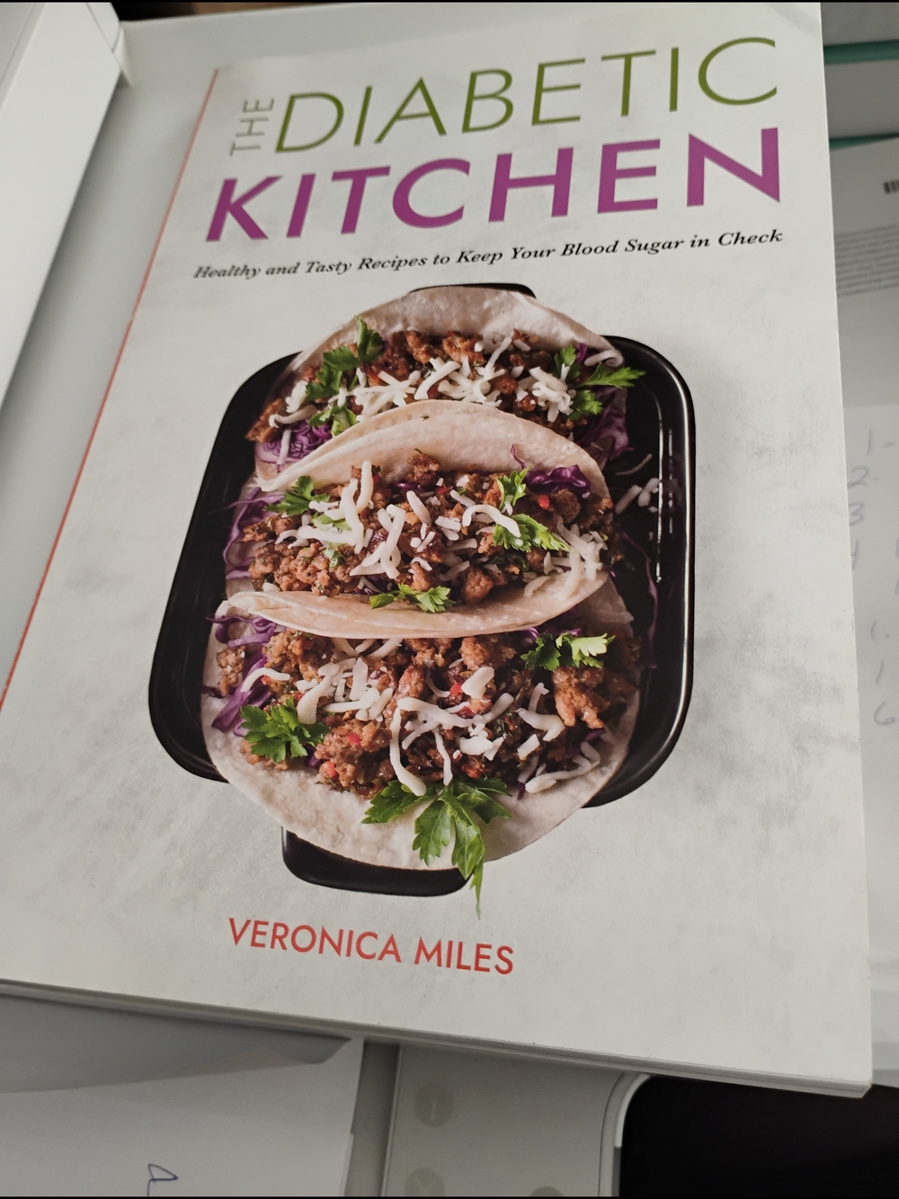 adidas White Cookbook Cover with Purple and Green Accents